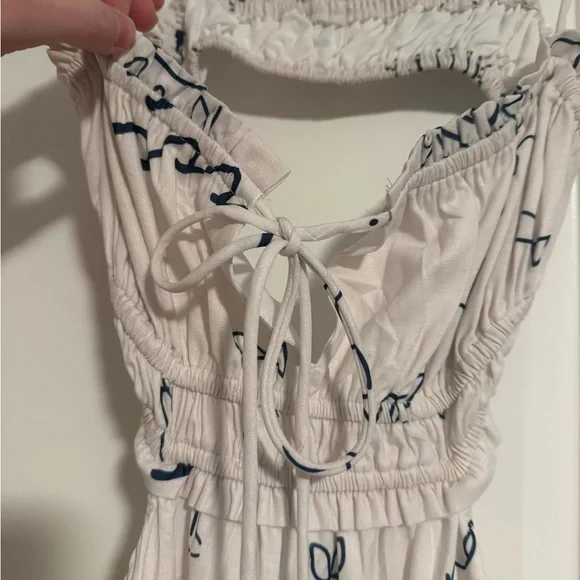 Elegant Cream Sun Print Maxi Dress - Picture 3 of 8